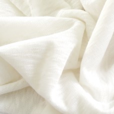 Тонкий вязаный полупрозрачный трикотаж. Молочный