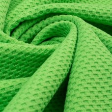 Трикотаж рельефный в микро прямоугольник. Цвет - сочный зеленый